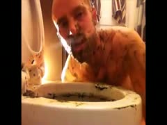 Man eating poop in a toilet bowl